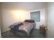 Comfortable bedroom with a cozy bed and plenty of natural light at 5707 W Mills Rd, Indianapolis, IN 46221
