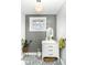 Bathroom vanity with patterned tile floor at 5718 E Pleasant Run Parkway North Dr, Indianapolis, IN 46219