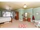Bedroom with a decorative ceiling and hard wood furniture at 5718 E Pleasant Run Parkway North Dr, Indianapolis, IN 46219