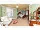 Spacious bedroom with natural light, hard wood furniture and walk in closet at 5718 E Pleasant Run Parkway North Dr, Indianapolis, IN 46219