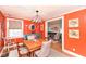 Vibrant dining room with hardwood floors and a stylish chandelier at 5718 E Pleasant Run Parkway North Dr, Indianapolis, IN 46219