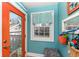 Entryway with an orange door at 5718 E Pleasant Run Parkway North Dr, Indianapolis, IN 46219