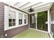 Screened porch featuring a charming space with open views and a comfortable setting, perfect for relaxing at 5718 E Pleasant Run Parkway North Dr, Indianapolis, IN 46219