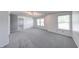 Large bedroom with updated carpet, fresh paint and an abundance of natural light at 5989 Ashmore Ln, Carmel, IN 46033