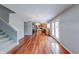 Bright living room features hardwood floors and double doors to the backyard at 5989 Ashmore Ln, Carmel, IN 46033