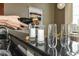Wet bar with champagne glasses being poured at 624 E Walnut St # 21, Indianapolis, IN 46204