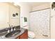 Bathroom with granite countertop sink and toilet at 624 E Walnut St # 21, Indianapolis, IN 46204