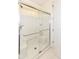 Bright bathroom features a spacious glass shower with convenient built in seating at 624 E Walnut St # 21, Indianapolis, IN 46204