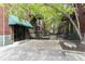 Charming brick apartment building with a gated entrance, offering a secure and inviting community setting at 624 E Walnut St # 21, Indianapolis, IN 46204