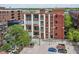Updated brick building with large windows and parking in downtown neighborhood setting at 624 E Walnut St # 21, Indianapolis, IN 46204