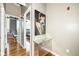 Stylish hallway with beautiful wood floors leads to rooms with ample sunlight at 624 E Walnut St # 21, Indianapolis, IN 46204