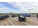 Spacious rooftop deck provides plentiful seating, with panoramic views at 624 E Walnut St # 21, Indianapolis, IN 46204