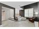 Spacious basement featuring neutral carpet, stone fireplace, and a staircase at 6404 Bayside Ct, Indianapolis, IN 46250