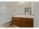 Bathroom featuring a vanity with wood cabinets and a glass-enclosed shower at 6404 Bayside Ct, Indianapolis, IN 46250