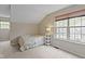 Bedroom featuring a window and neutral colored carpet at 6404 Bayside Ct, Indianapolis, IN 46250