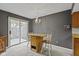 Cozy kitchen space with a small dining table, chairs, and light fixture at 6404 Bayside Ct, Indianapolis, IN 46250