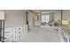Spacious main bedroom featuring neutral colors, carpet floors, closet and ensuite bathroom at 6404 Bayside Ct, Indianapolis, IN 46250