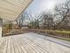 Wooden back deck overlooking a wooded lot at 6413 N Wheeling Ave, Muncie, IN 47304