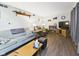 Cozy living room with modern furniture, wood flooring, and natural light at 6413 N Wheeling Ave, Muncie, IN 47304