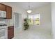 Bright breakfast nook with pendant lighting and a window view at 6524 Turf Way, Anderson, IN 46013