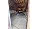Large barn interior with a concrete floor and exposed rafters, ideal for storage or workshop space at 6835 W Us Highway 36, Danville, IN 46122
