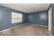 Bedroom with neutral carpeting and a window for natural light at 7951 Busby Bend Dr, Noblesville, IN 46062