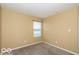 Bedroom featuring neutral paint, carpeting, and mini blinds at 7951 Busby Bend Dr, Noblesville, IN 46062