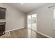 Bright dining area with sliding glass doors that lead to a back deck at 7951 Busby Bend Dr, Noblesville, IN 46062
