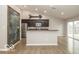 Open concept kitchen, stainless appliances, and a decorative chalkboard at 7951 Busby Bend Dr, Noblesville, IN 46062