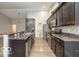 Stylish kitchen with granite countertops, stainless steel appliances, and ample cabinet space at 7951 Busby Bend Dr, Noblesville, IN 46062