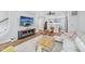 Stylish living room showcases an open layout, ceiling fan, hardwood floors, and comfortable seating at 801 Bates St, Indianapolis, IN 46202