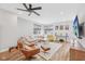 Spacious living area features hardwood floors, large windows, and cozy seating arrangement at 801 Bates St, Indianapolis, IN 46202