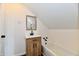 Bathroom featuring a tub and vanity with modern black hardware at 1015 Main St, Elwood, IN 46036