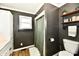 Bathroom with a toilet and cabinets at 1015 Main St, Elwood, IN 46036