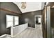 Second story landing with carpet and access to rooms at 1015 Main St, Elwood, IN 46036