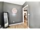 Hallway with wooden floors at 1015 Main St, Elwood, IN 46036