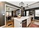 Charming kitchen with granite counters, stainless steel appliances, and a center island at 1015 Main St, Elwood, IN 46036