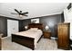 Cozy main bedroom with wood accents and neutral decor at 1015 Main St, Elwood, IN 46036