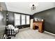 Bright office featuring gray walls, plush carpet, and lots of natural light at 1015 Main St, Elwood, IN 46036