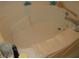 Close up of a spotless bathtub with a chrome faucet at 10762 Galant Fox Ct, Indianapolis, IN 46234