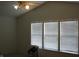 Bedroom with vaulted ceiling, fan and window views at 10762 Galant Fox Ct, Indianapolis, IN 46234