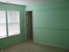 Bedroom with bright walls, window views and door into closet at 10762 Galant Fox Ct, Indianapolis, IN 46234