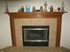 Elegant fireplace with decorative mantle and tile surround, creating a cozy focal point at 10762 Galant Fox Ct, Indianapolis, IN 46234