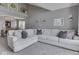 Spacious living room featuring a large sectional sofa and stylish decor at 1228 Easton Point Dr, Greenwood, IN 46142