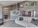 Open-concept living area with a view of the staircase and dining room at 1228 Easton Point Dr, Greenwood, IN 46142