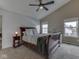 Cozy main bedroom with ample natural light, carpet, and vaulted ceiling, creating a comfortable and relaxing retreat at 1228 Easton Point Dr, Greenwood, IN 46142