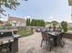 Outdoor dining area and barbecue on a large concrete patio at 1228 Easton Point Dr, Greenwood, IN 46142