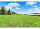 The expansive green lawn offers endless possibilities for outdoor enjoyment and activities in a peaceful setting at 12404 Rose Haven Dr, Indianapolis, IN 46235