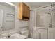 Accessible bathroom features a walk-in tub, updated fixtures, and ample storage space at 12404 Rose Haven Dr, Indianapolis, IN 46235