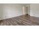 Spacious bedroom featuring light-colored wood floors and neutral walls at 12404 Rose Haven Dr, Indianapolis, IN 46235